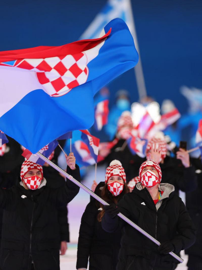 Croatian athletes march out in the athletes' parade at the Opening Ceremony of the Beijing 2022 Paralympic Games.