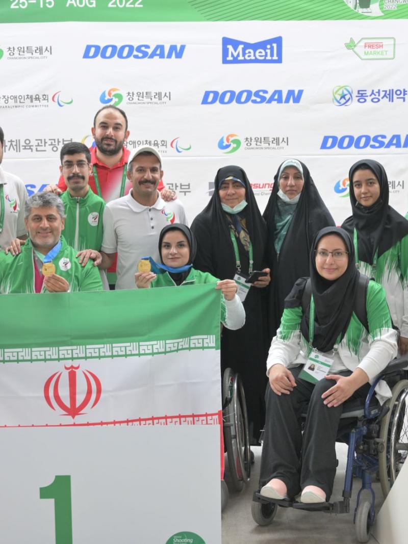 Iran team celebrate their gold medal at podium.