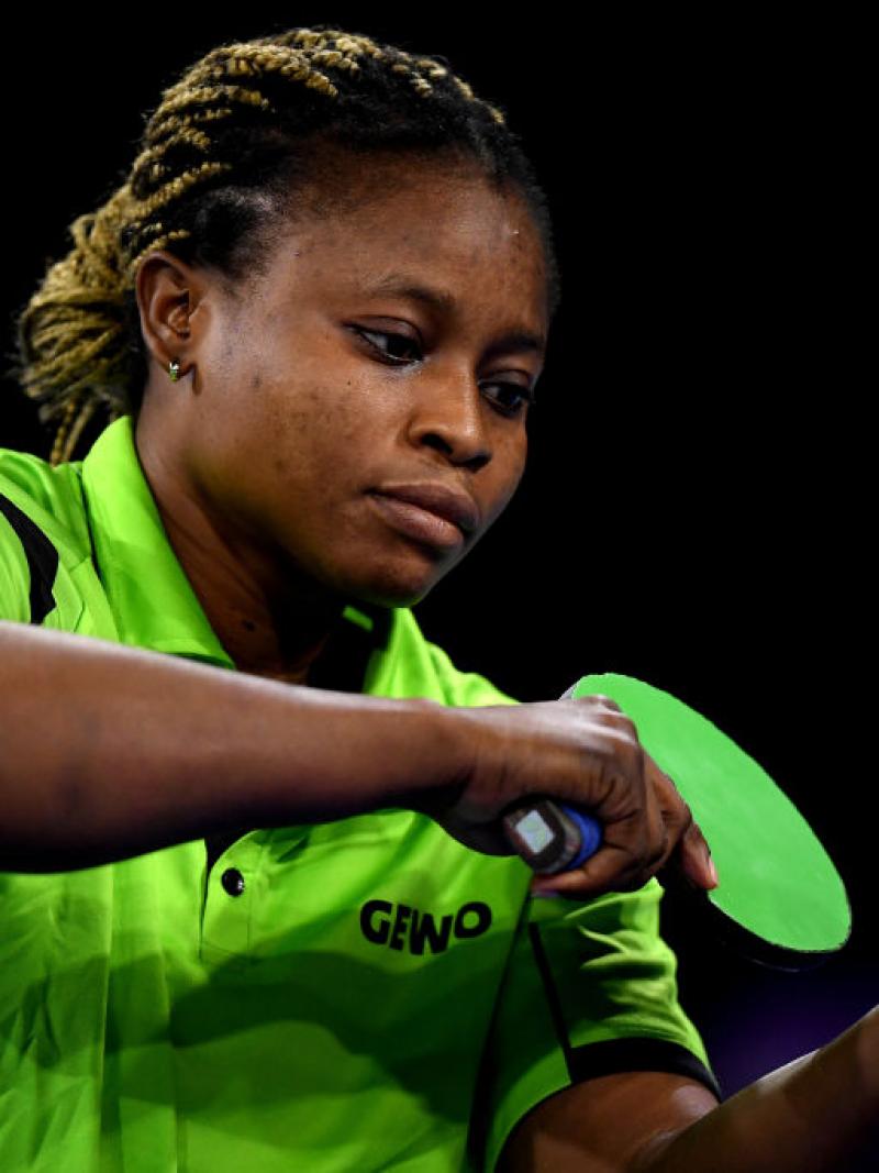 A female table tennis player serves during a match at the Birmingham 2022 Commonwealth Games.