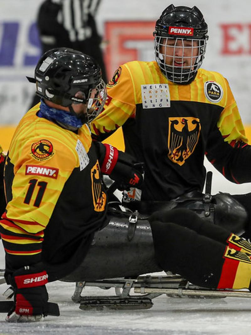 Three German Para ice hockey players on ice