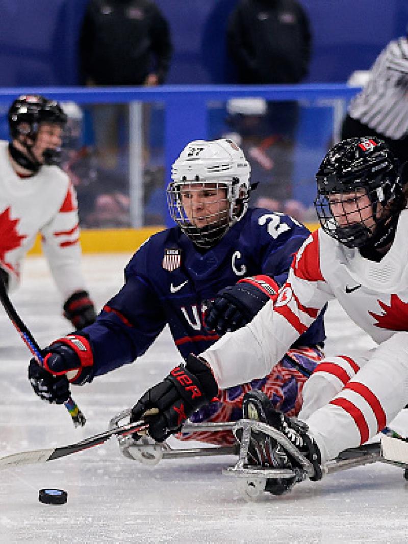 USA and Canada Para ice hockey players on ice 