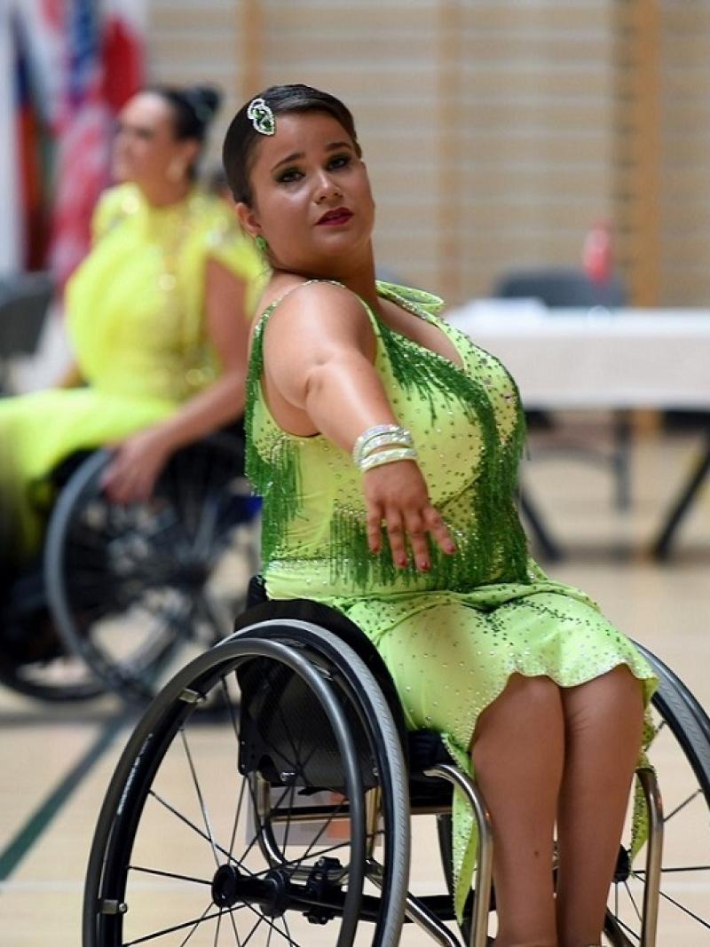 A female wheelchair dancer in a Para dance sport competition
