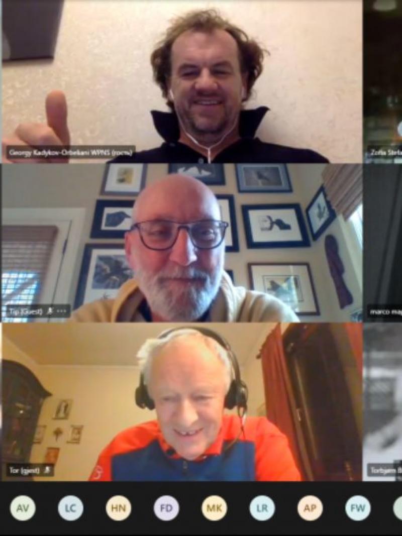 A computer screen showing a Zoom call with the image of eight participants