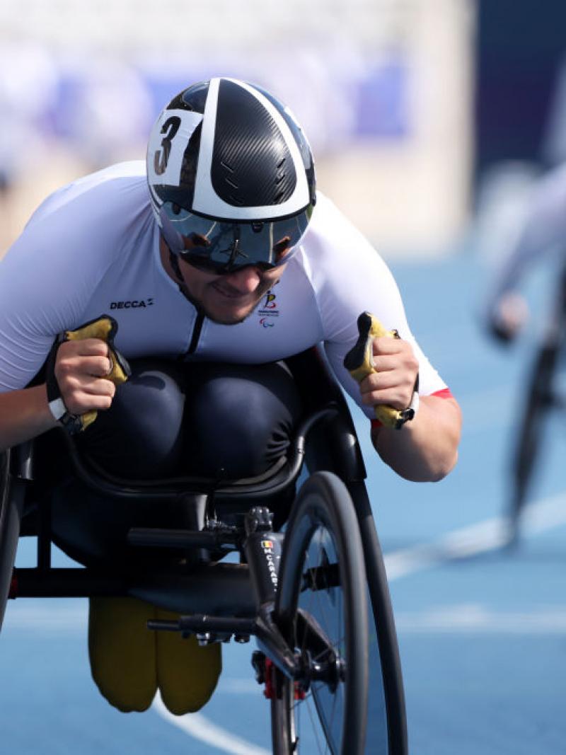 A male wheelchair racer in a Para athletics competition