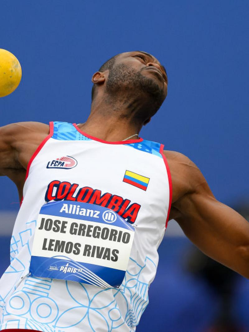 A man throwing in a shot put competition
