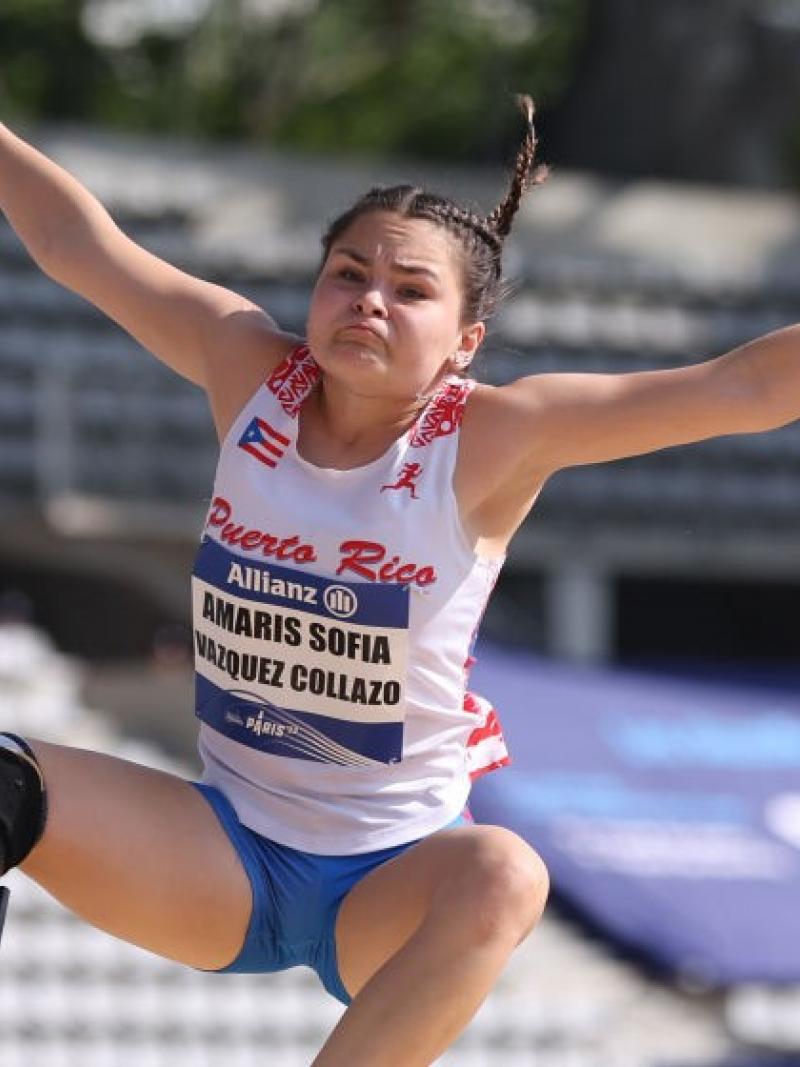 A female athlete competes in long jump.