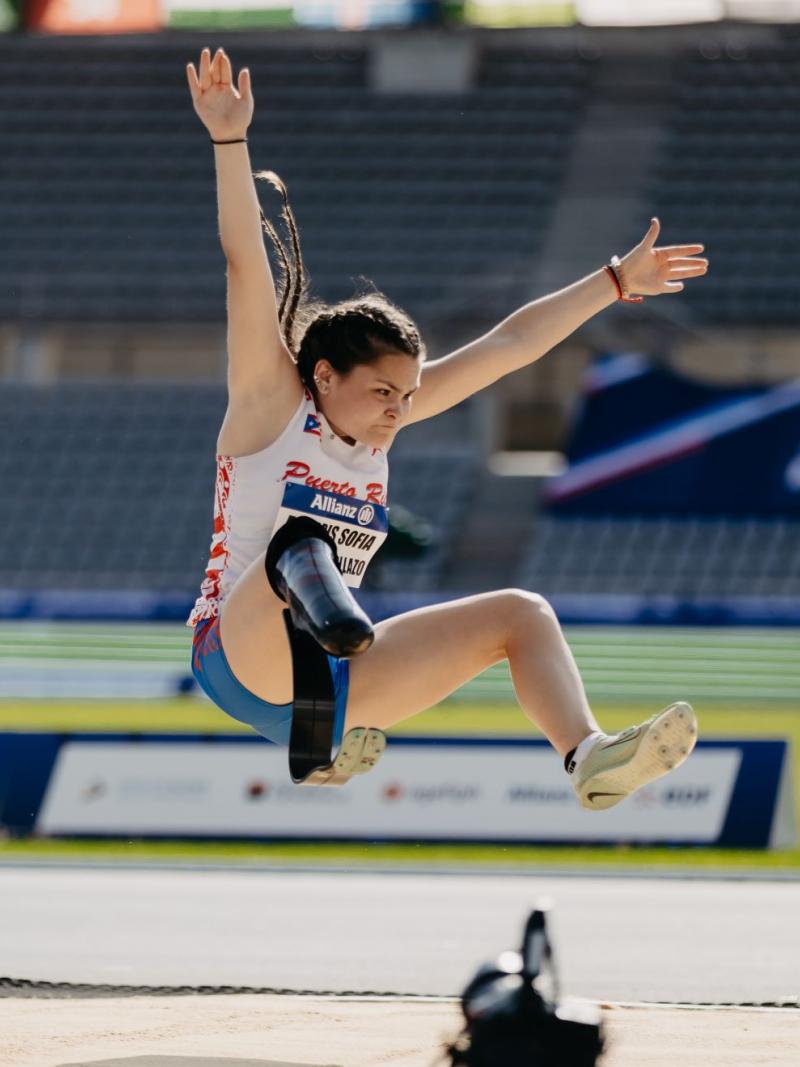 A female athlete wearing a blade compete in long jump