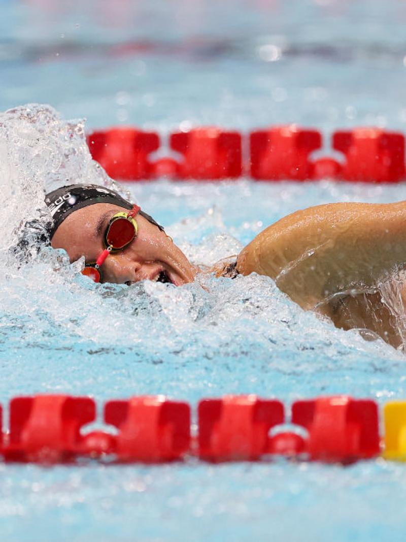 A female swimmer in a competition