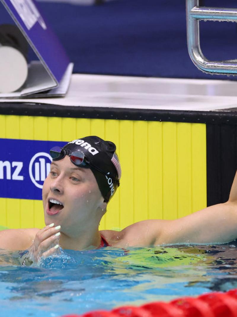 A female Para swimmer reaction surprised in the water