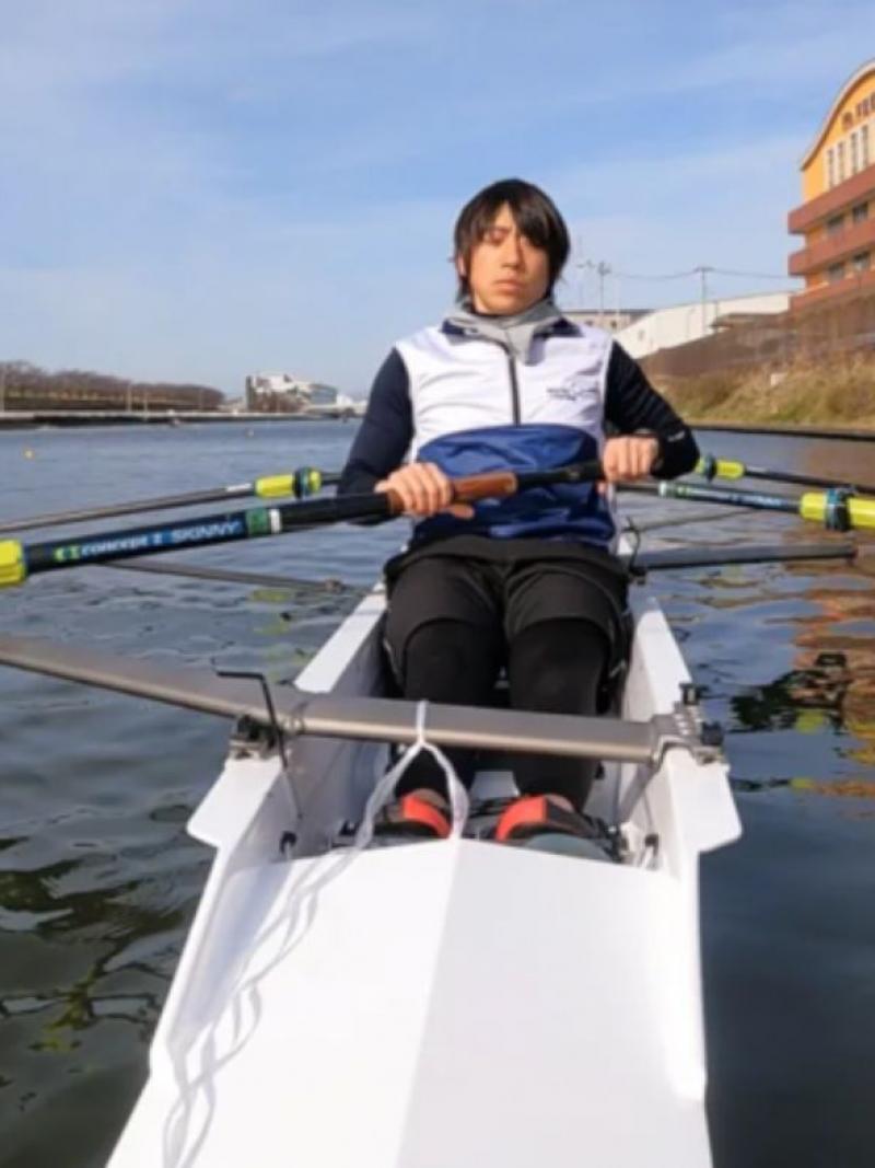 Japanese man in rowing boat