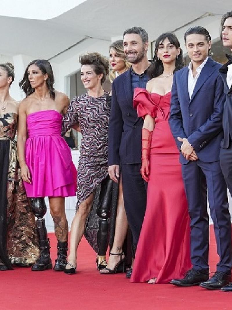 Italian Paralympians pose during the Red Carpet of the Venice Film Festival with the cast of Fantastici 5