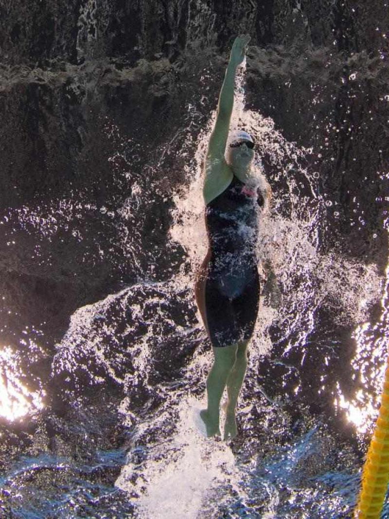 The underwater image of a female swimmer