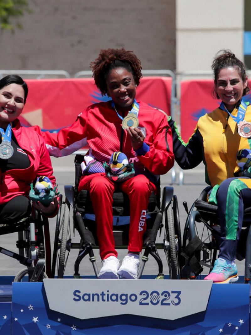 Three women on a podium at the Santiago 2023 Parapan American Games