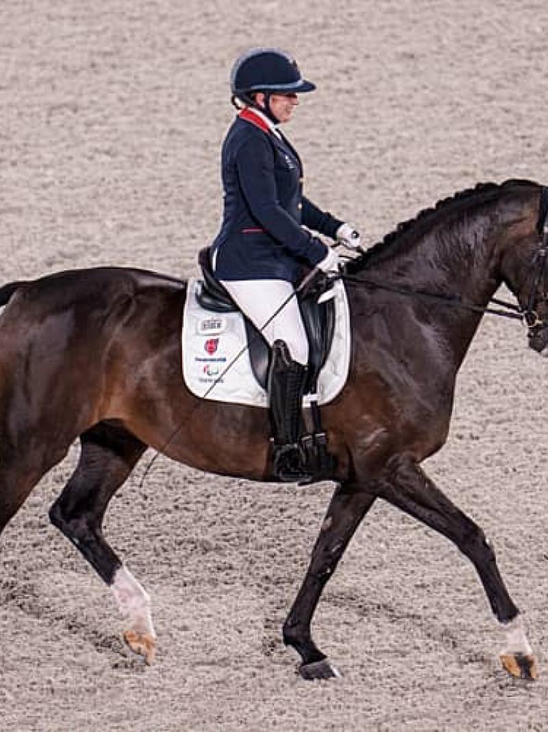 Para equestrian rider Natasha Baker riding a dressage horse