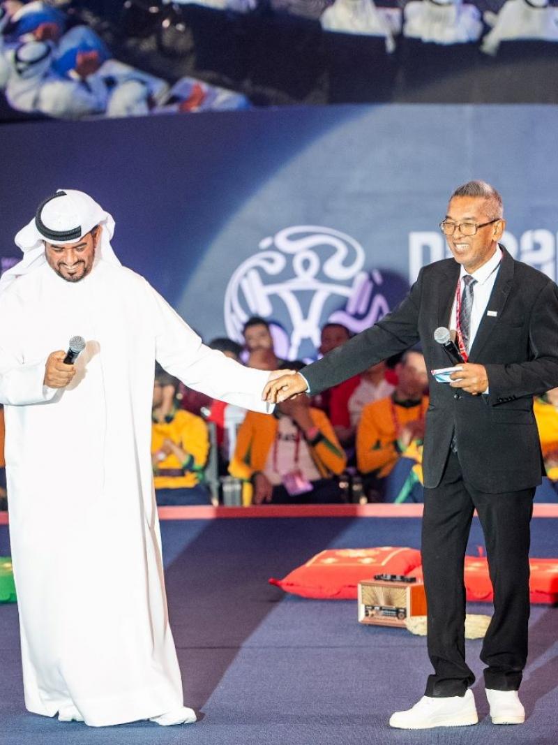Two men standing on the stage during the Para Powerlifting World Championships in Dubai