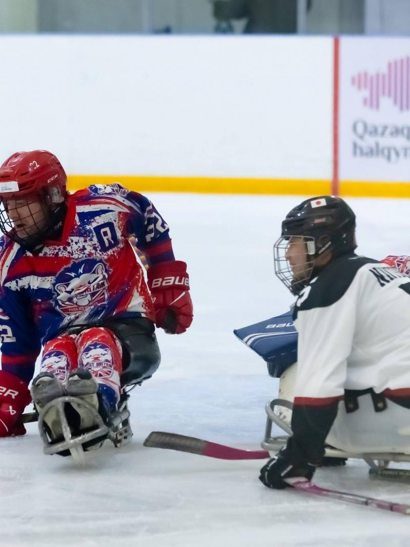 Para Ice hockey players in action 
