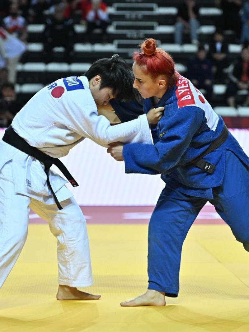 Two female judokas in action