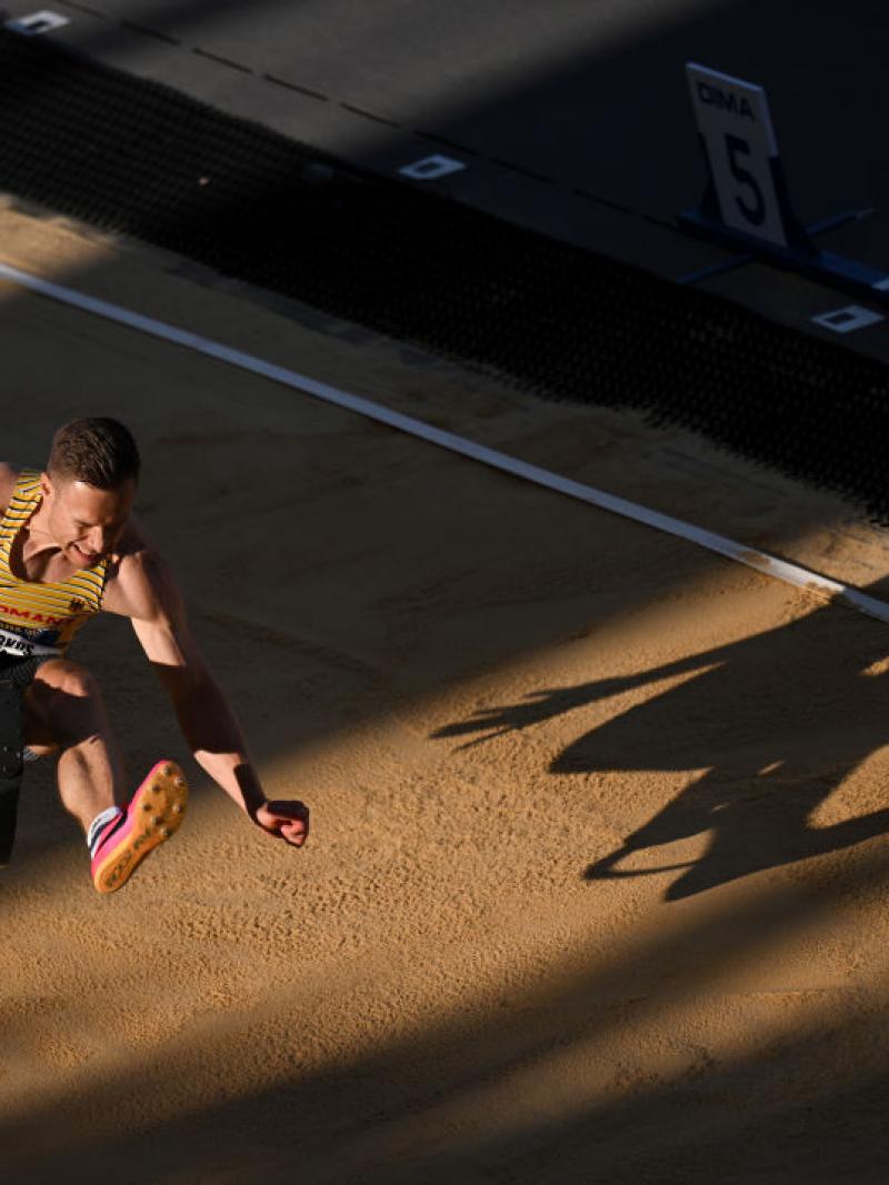 A male long jumper with a prosthetic right leg