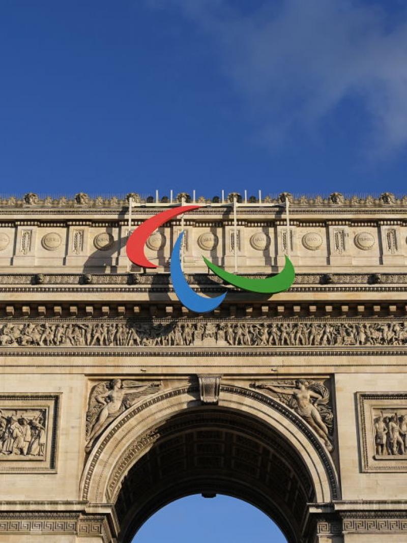 The Paralympic symbol, known as the Agitos, installed on top of the French monument Arc de Triomphe in Paris