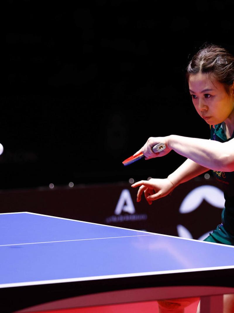 A female Para table tennis player in action.