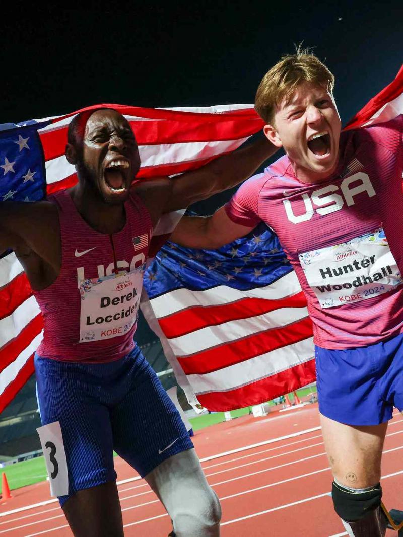 Athketes celebrate their medals