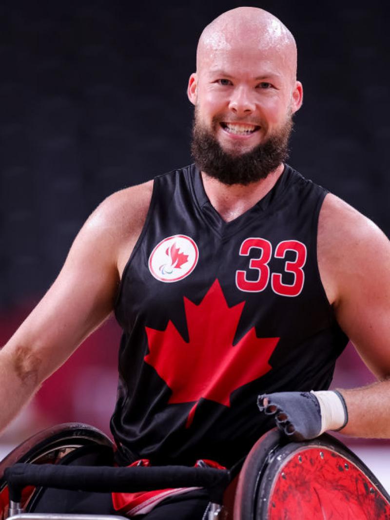 A male wheelchair rugby player in action during the Tokyo 2020 Paralympics.