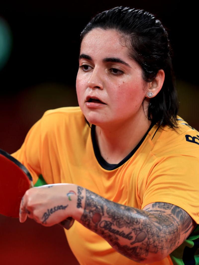 A female Para table tennis player in action