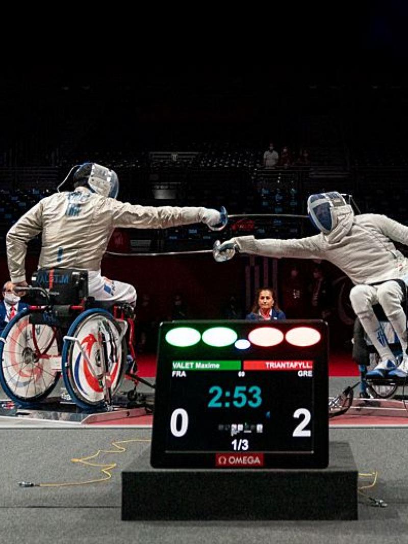 Two wheelchair fencers in action at the Tokyo 2020 Paralympic Games