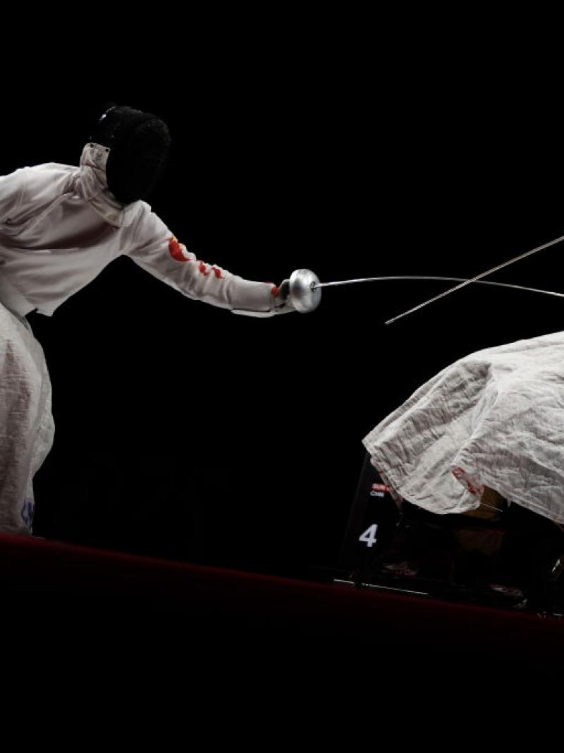Two wheelchair fencers in action at the Tokyo 2020 Paralympic Games