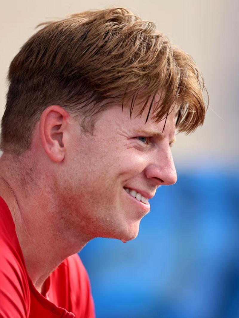 Para athletics star Hunter Woodhall smiling after a race 