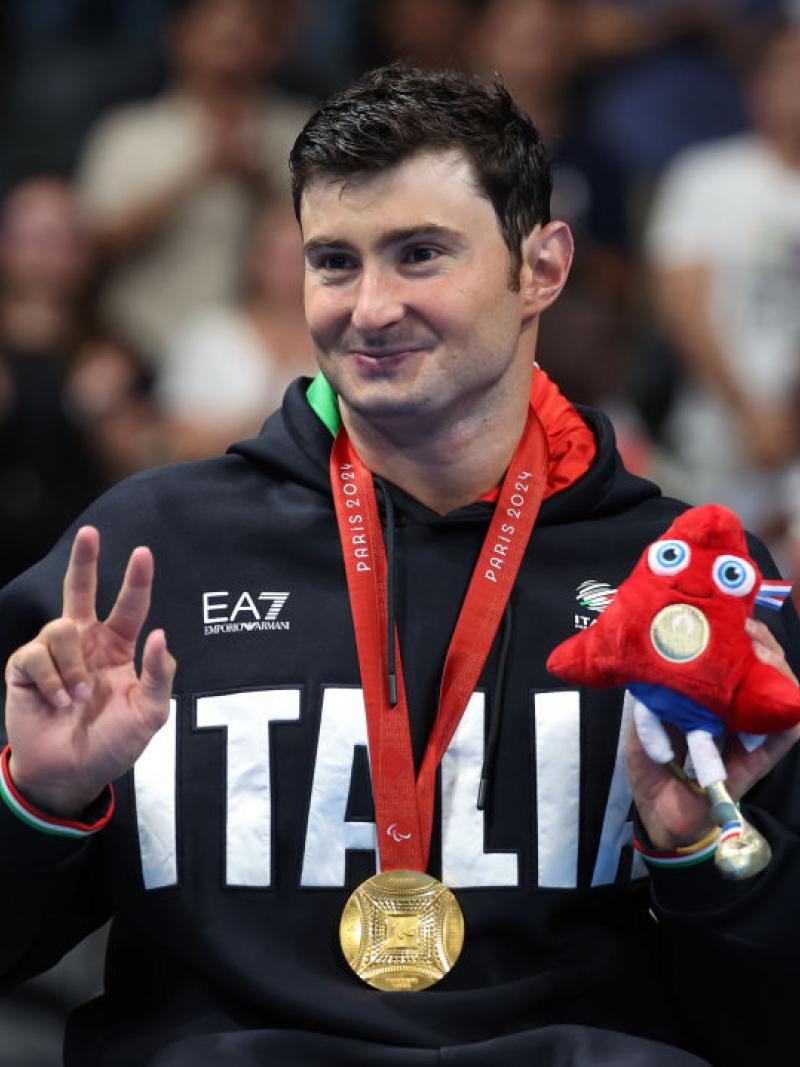 Francesco Bocciardo poses for the camera with his gold medal