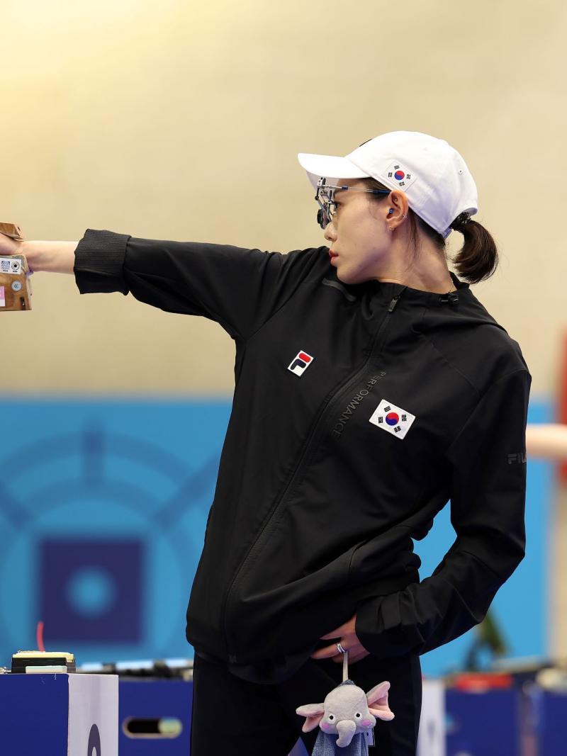 A female shooter in a pistol event