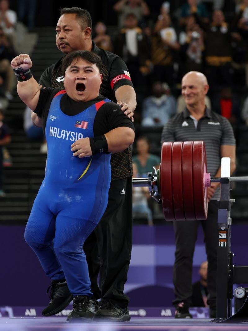 An athlete reacts with ecstacy