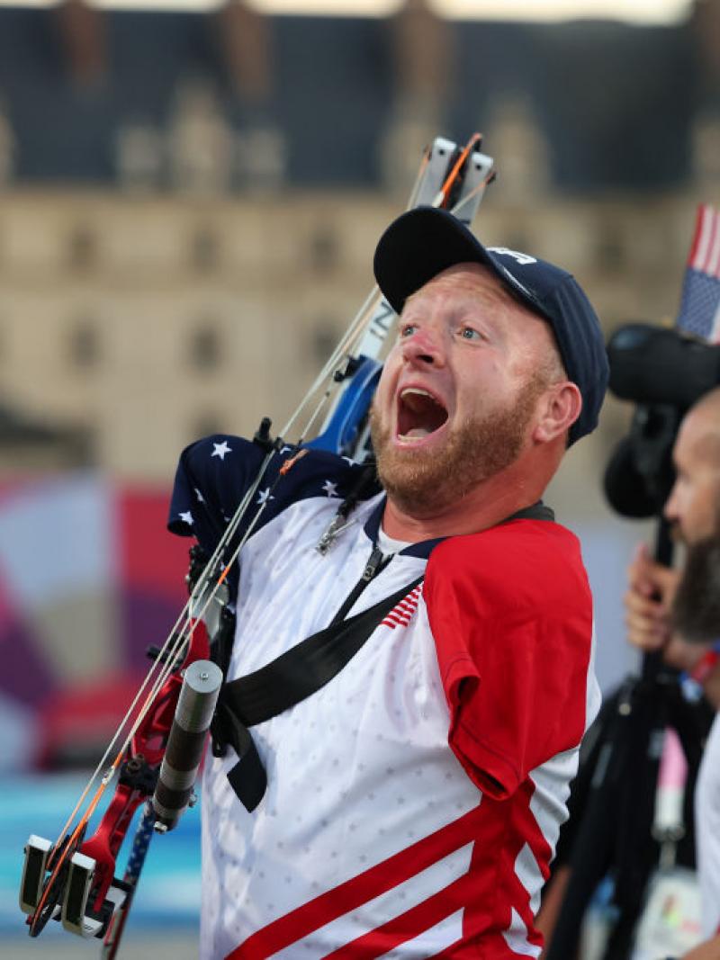 Para archer Matt Stuzman screams in delight after winning gold