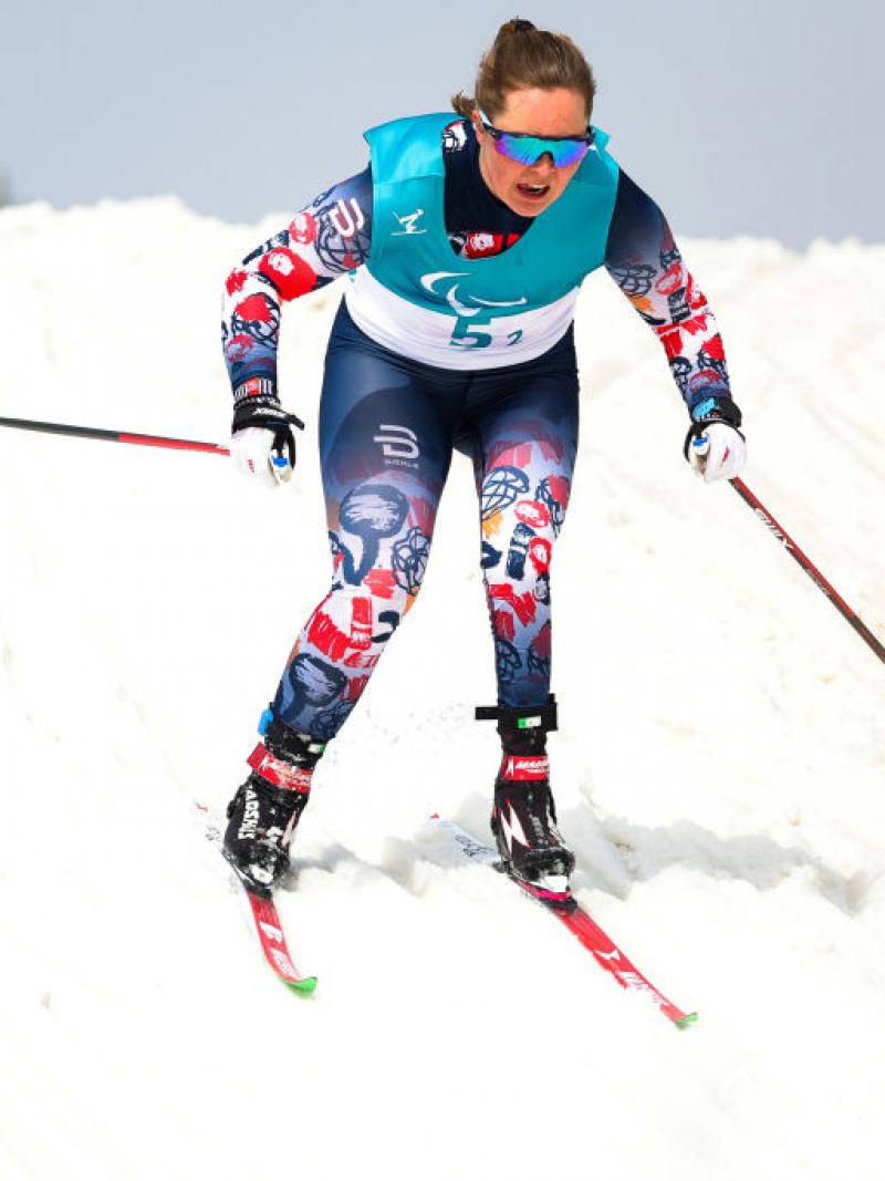 A female Para cross-country skier in action