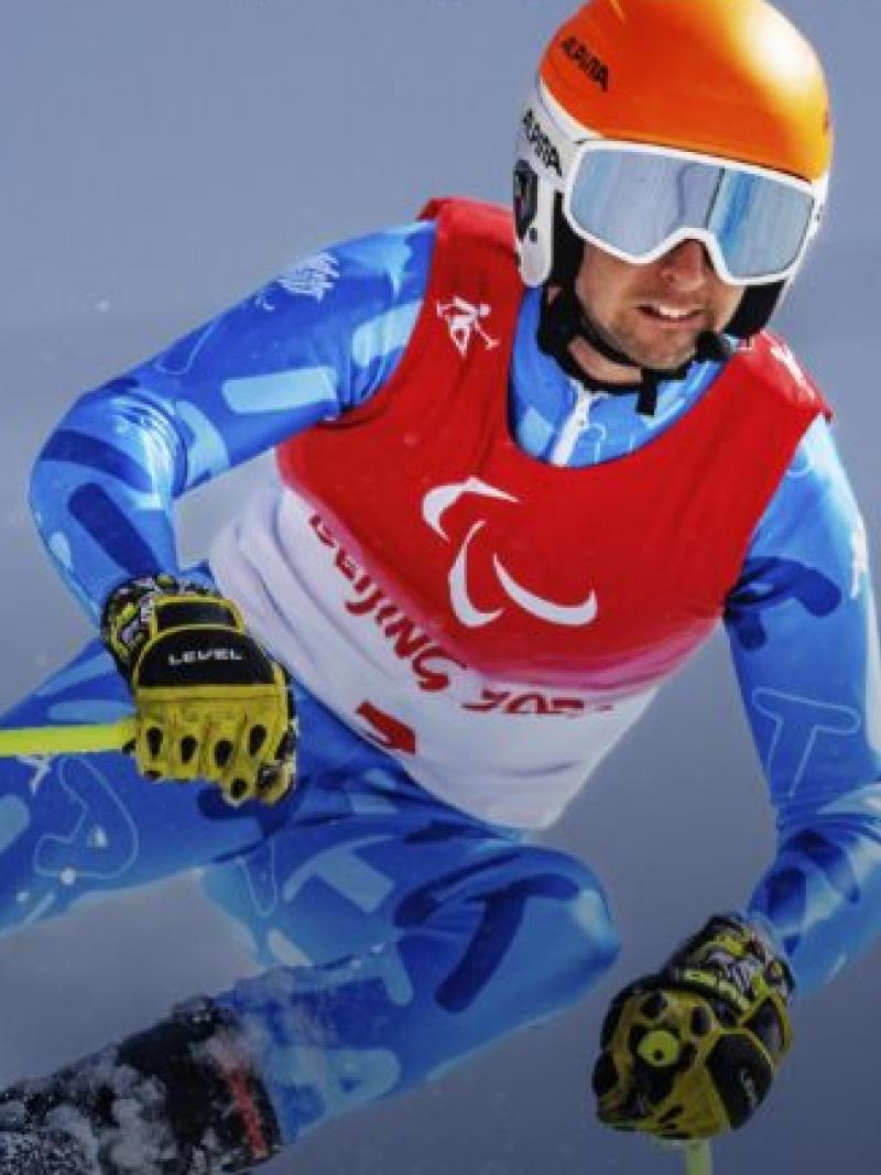 Italian Para skier Giacomo Bertagnolli competes at the Beijing 2022 Paralympic Games. Text says: Giacomo Bertagnolli, Italy, Para Alpine Skiing, Team Visa. Milano Cortina 2025 Paralympic Winter Games. Global Ticket Pre-sale for VISA cardholders. March 5. Buy tickets now. Prices from EUR 10. Terms and conditions apply.