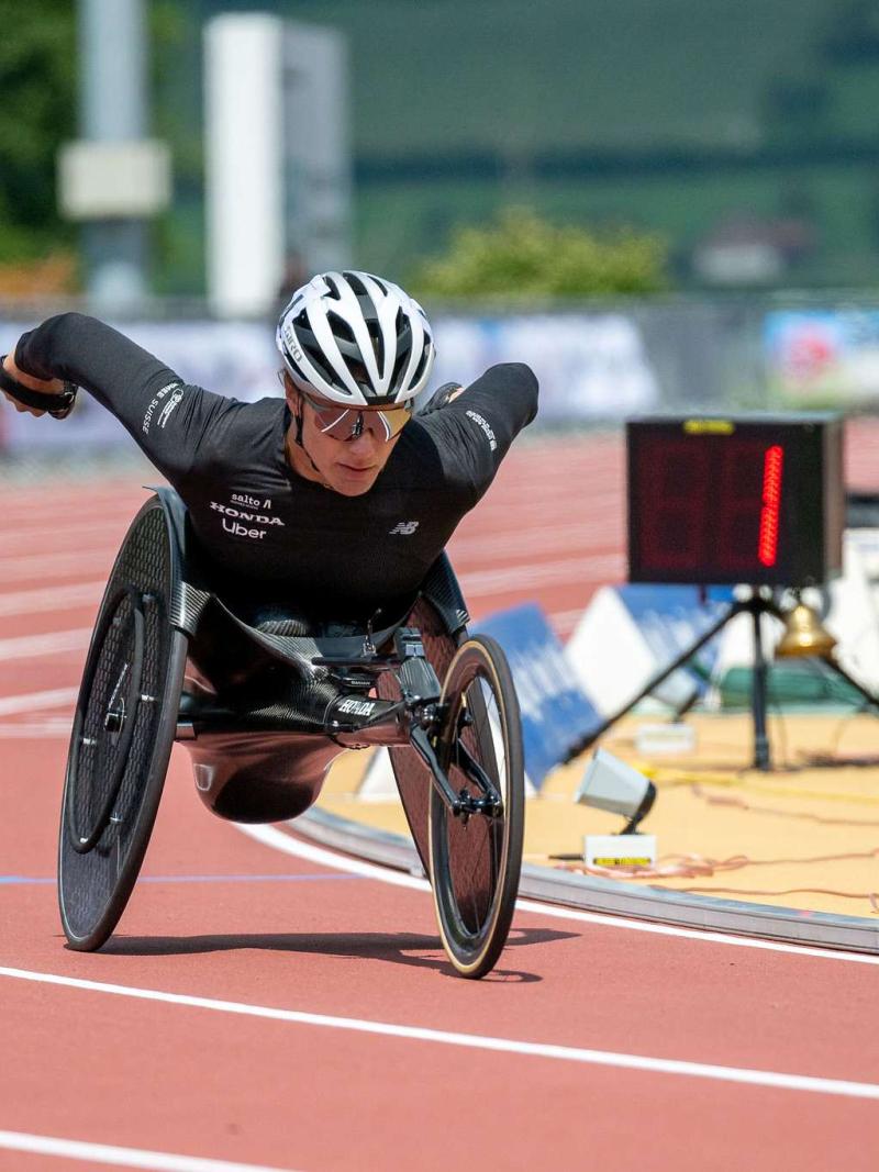 A wheelchair racer in action