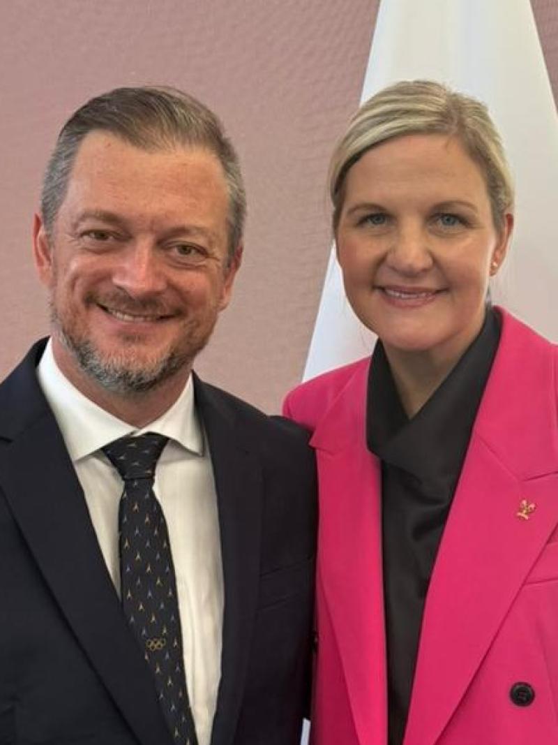 IPC Andrew Parsons and Kirsty Coventry posing for a photograph together