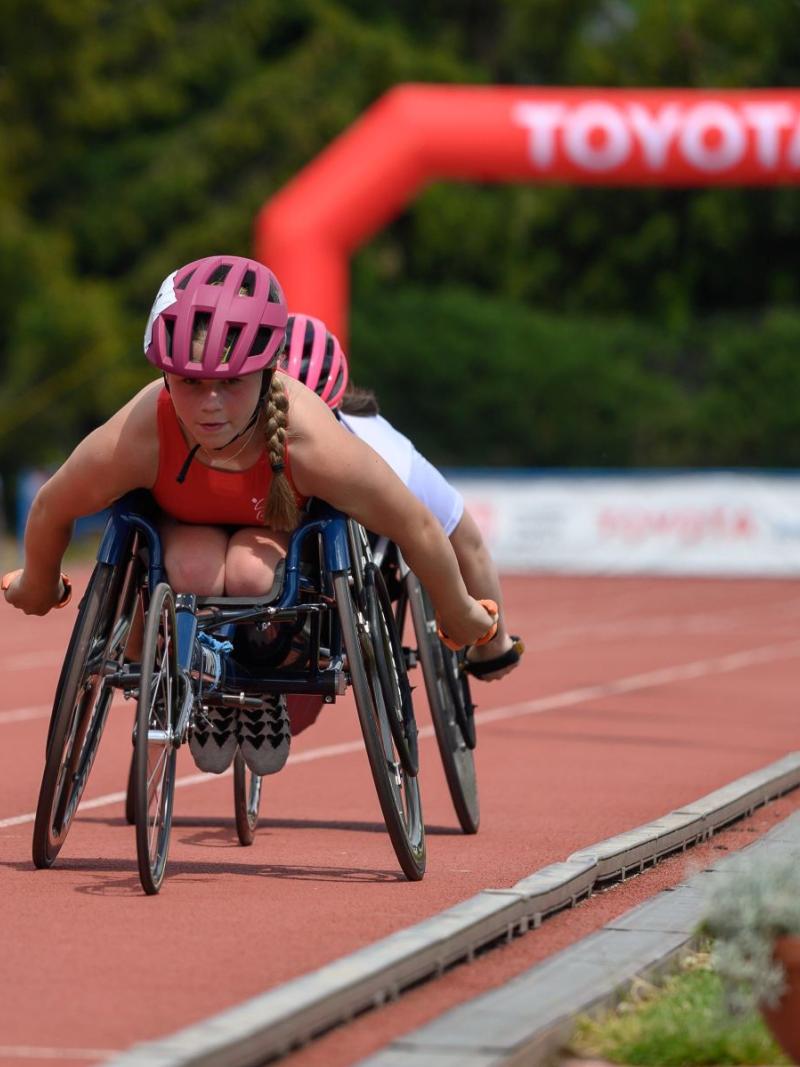 A wheelchair racing athlete in action