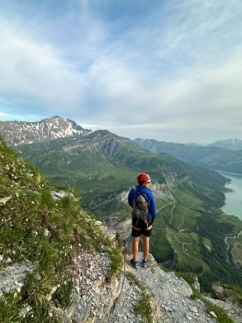 A collaged photo of a male athlete hiking and cycling