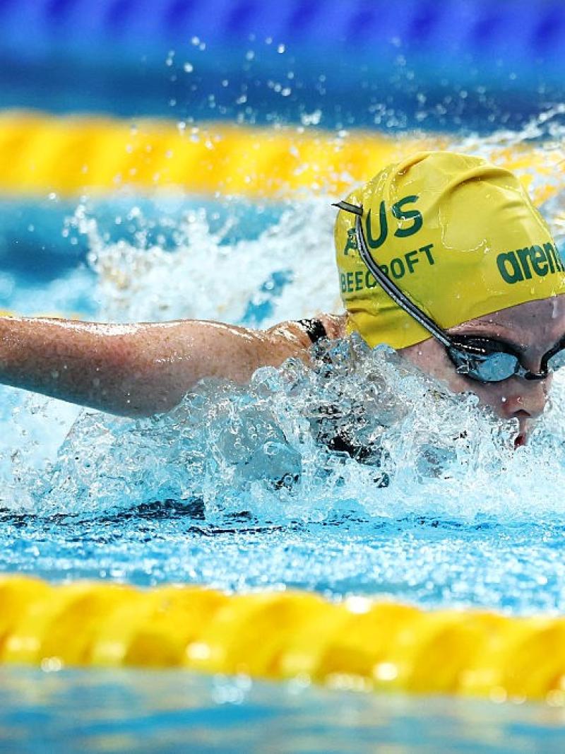 A female Para swimmer competing in a butterfly event