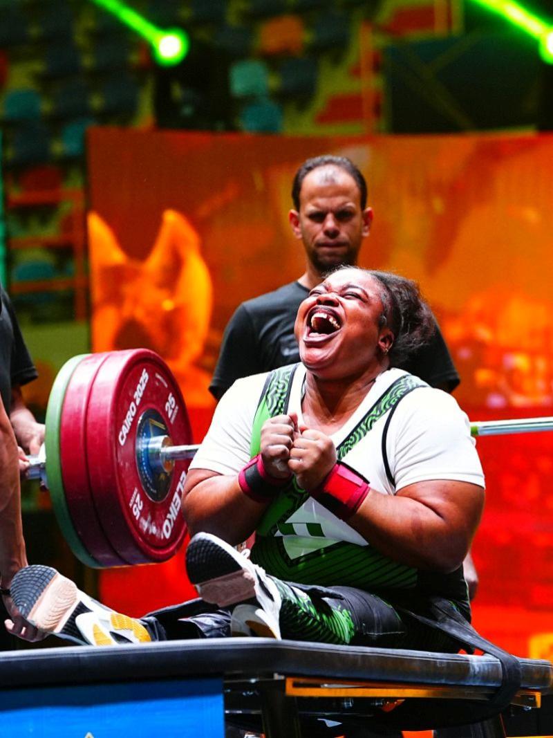 An athlete celebrates in joy