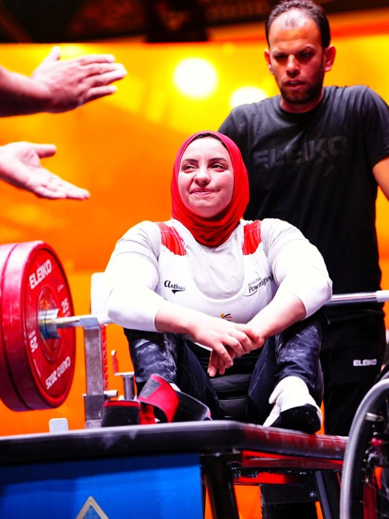 An athlete reacts after her lift