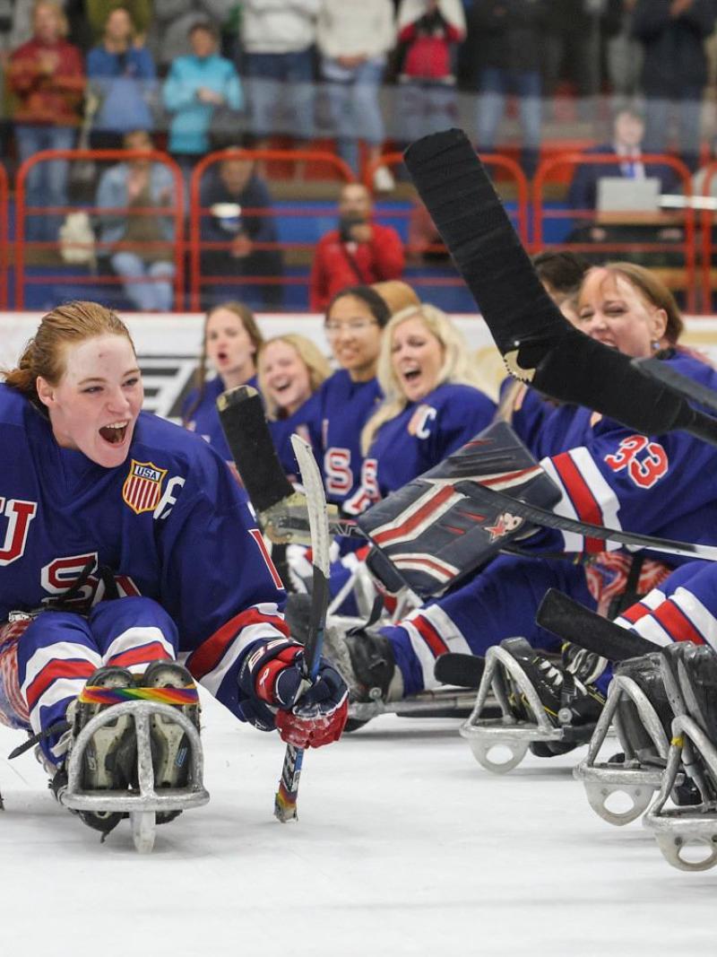 An athlete celebrates in joy