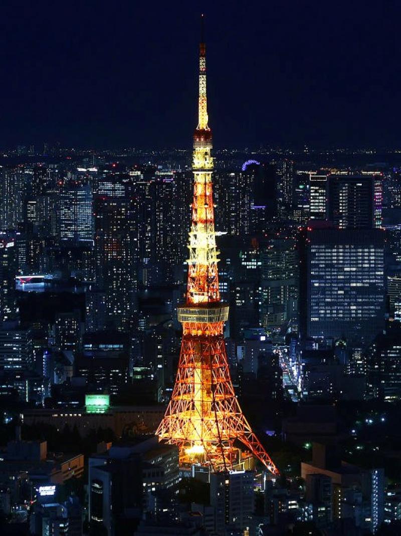 A photo of the Tokyo Tower taken at night