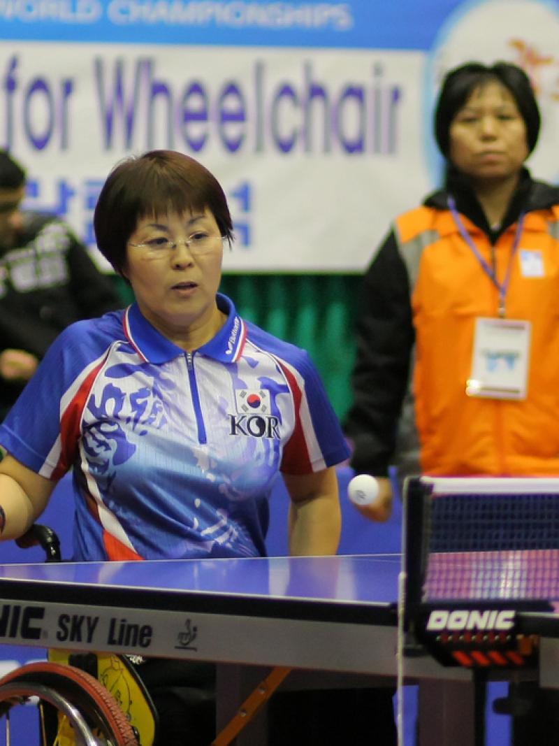 A Korean person is playing Table Tennis
