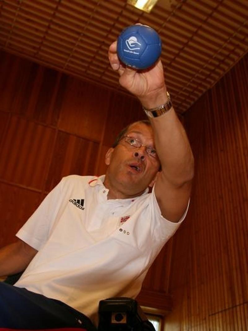 A picture of a man playing Boccia