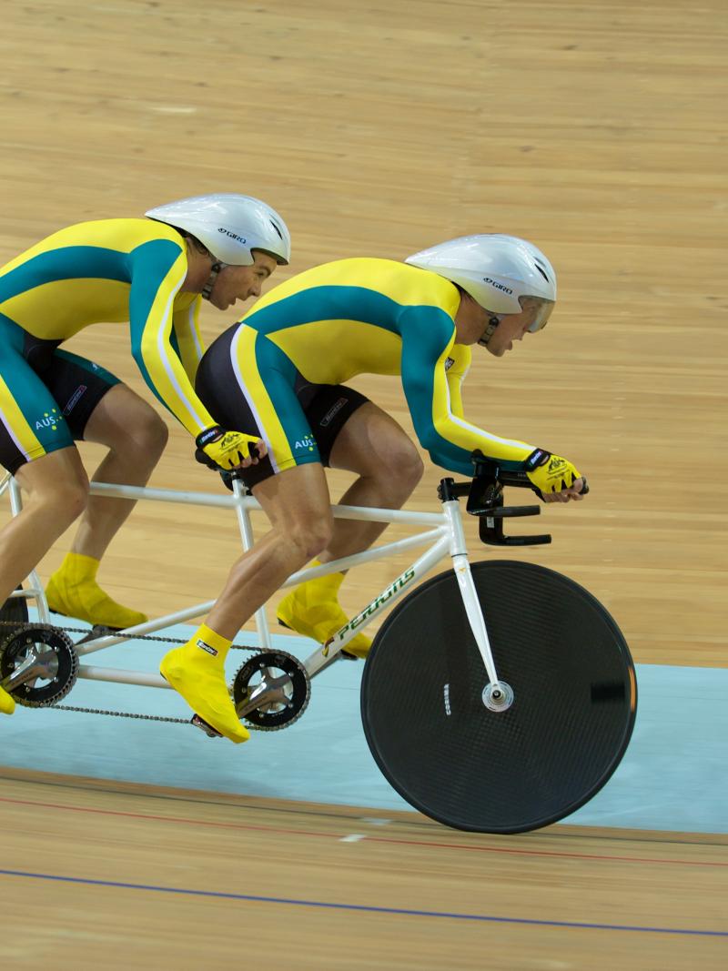 A picture of 2 men cycling