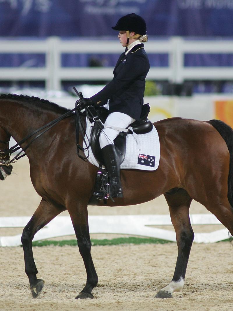 A picture of a woman riding