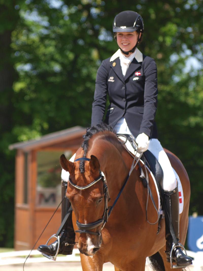 A picture of a woman riding